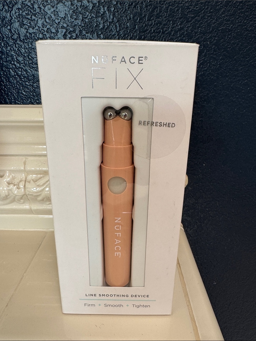 NuFACE FIX device